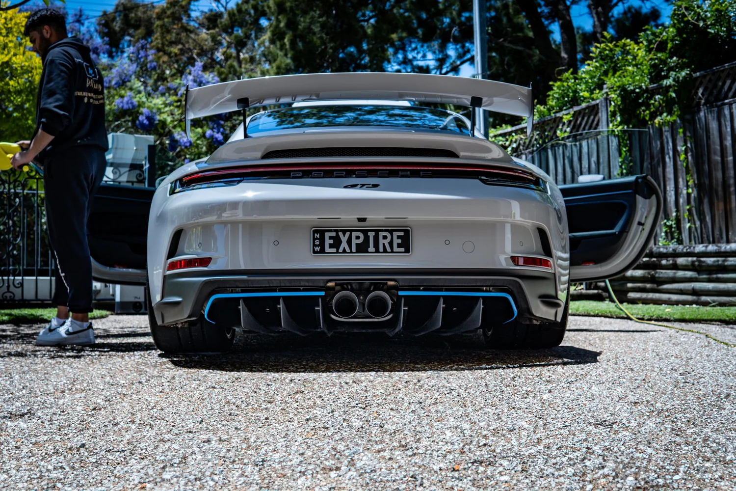 Detailed white Porsche in a Sydney driveway